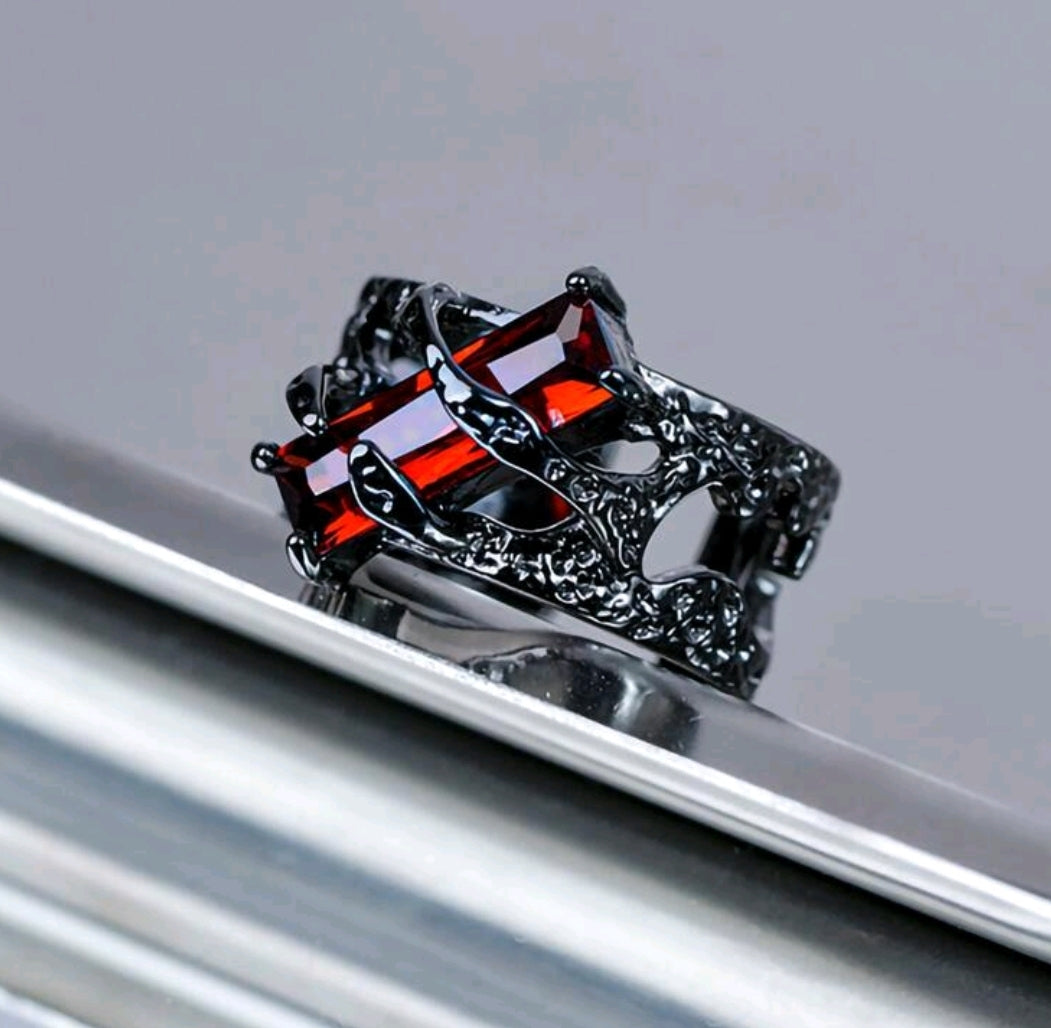 Adjustable funk ring with red rhinestone